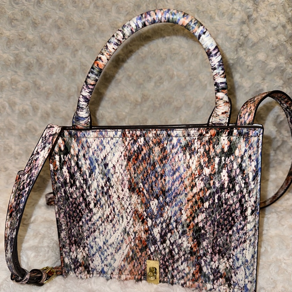Like New Purse. Animal print, with cross-body strap.